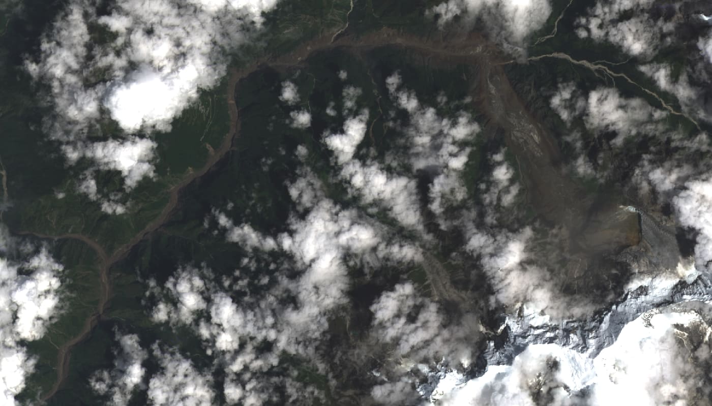 Landsat 9 satellite image of the same Rasuwa valley on 26 August 2026, the riverbed buried under mud after the flood